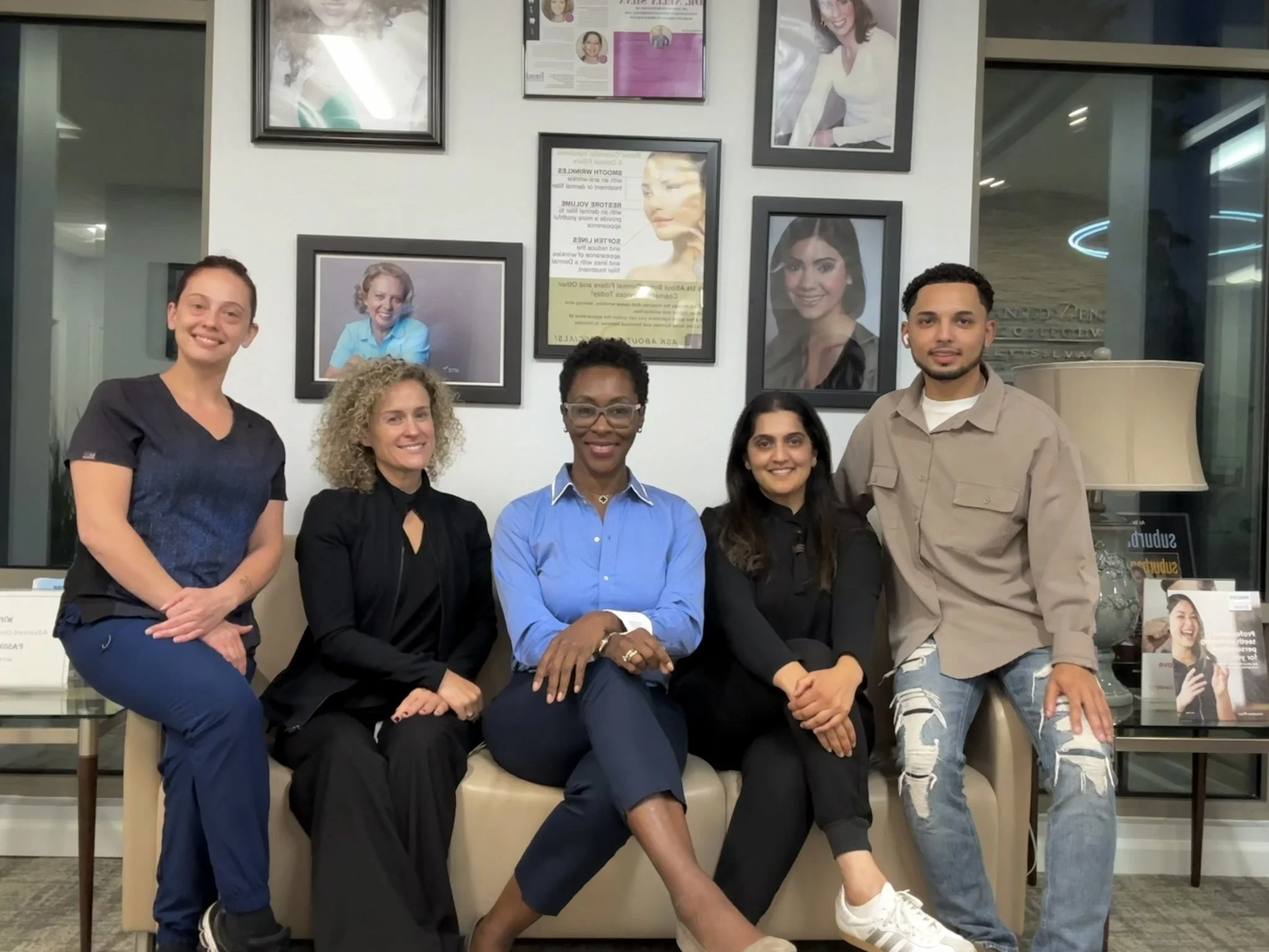 The Advanced Dentistry of Collegeville team sitting together in the office waiting area